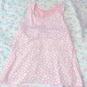 I am selling a pink tank top size (14/16) kids best used for athletic wear